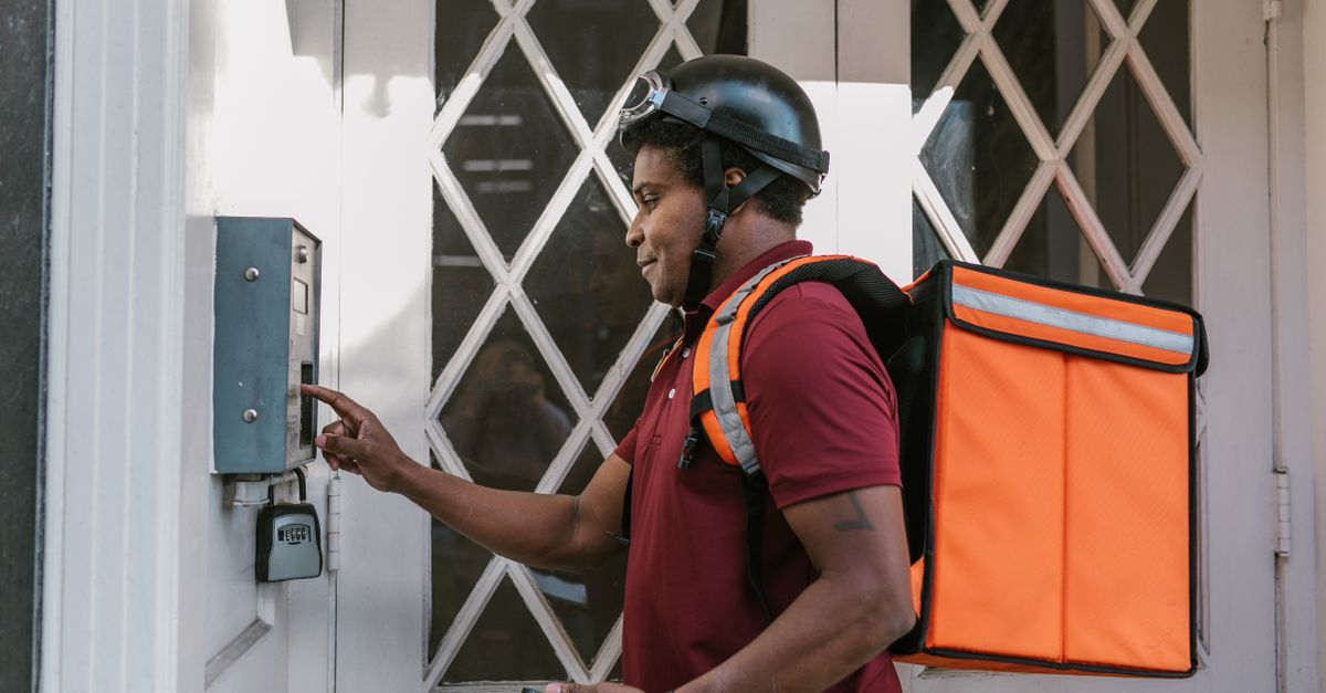 locksmith unlocking front door — Alpharetta Locksmith Key